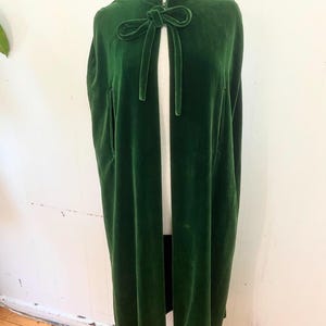 1960s emerald green cotton velvet cape with bow