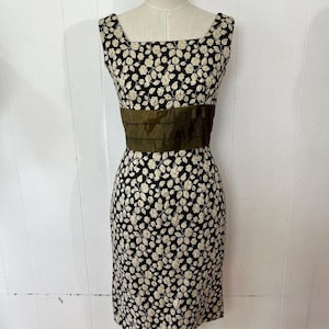 1960s black gold 3D floral brocade dress with a green satin cummerbund style waist