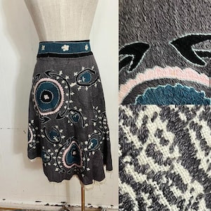 antique hand stitched cloth made into a skirt