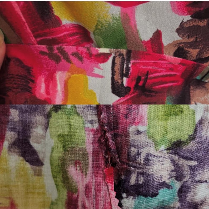 May include: Close-up of a colorful fabric with a floral pattern. The fabric is sewn together with a visible seam.