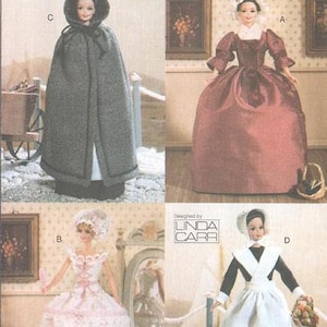 May include: A vintage sewing pattern for four doll outfits. The pattern is for a doll wearing a hooded cape, a doll wearing a long dress, a doll wearing a dress with a lace trim, and a doll wearing a white apron dress. The pattern is titled "Vogue Craft" and the pattern number is "7039".