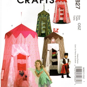May include: McCall's Crafts sewing pattern for children's play tents. The pattern features several tent designs, including a pink patterned tent, a camouflage tent, a red and white striped tent, and a brown tent with a skull and crossbones. A young girl in a fairy costume is also shown.