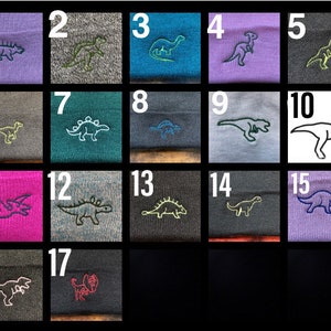 A series of images labeled 1 - 17 to show the different dinosaurs available to choose from to customise your chosen beanie hat colour.