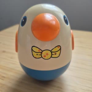 Vintage Roly Poly Musical Penguin