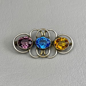 Art Deco Purple, Blue, and Yellow Glass Rhinestone Brooch-2 Inches Across. Free shipping.