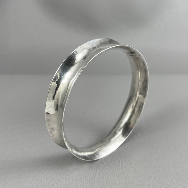 Silver Anticlastic Forged Bangle Bracelet-2 1/4 Inches Across. Fits a Small Wrist-Please Read Description. Free shipping.