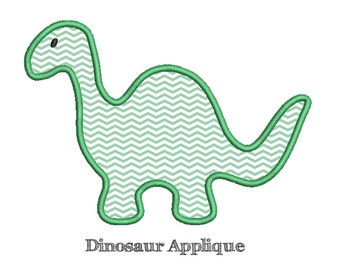 May include: Green dinosaur applique with a chevron pattern. The dinosaur has a long neck and a small tail.