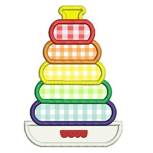 May include: A colorful stacking toy with a gingham pattern. The toy is made of five rings in different colors, stacked on top of each other. The rings are stacked on a white base with a red rim.