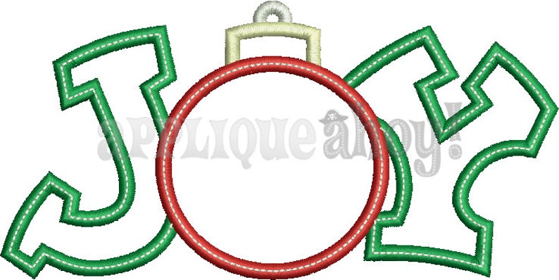 May include: A Christmas ornament design with the word "JOY" in green, stitched lettering. The "O" is a red circle, and the ornament's top is beige. The design is likely for embroidery or applique.