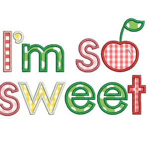 May include: A whimsical design featuring the phrase "I'm so sweet" in colorful, embroidered letters. The letters have various patterns, including polka dots, gingham, and a cherry illustration, all set against a white background.