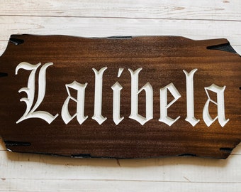 Outdoor Wood Sign with Old World Font in White Carved Letters and Black Hand Cut Outer Rustic Edge