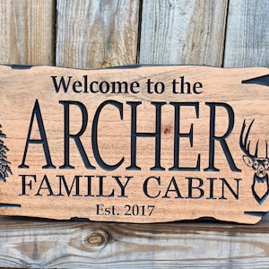 Outdoor Wooden Carved Cabin Sign with Pine Tree and Whitetail Deer on Rot Resistant plaque by Benchmark Signs