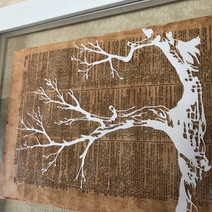Tree silhouette paper cut art. Papercut tree Silhouette art. Antique Book page, library decor book lovers