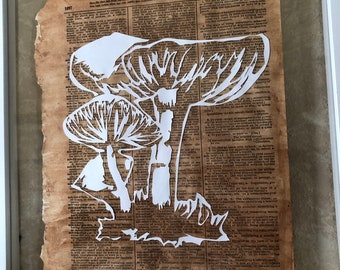 Paper cut art Mushroom. Silhouette art. Antique Book page, library decor