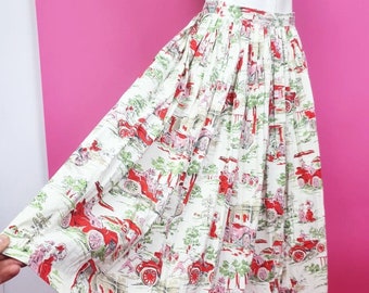 Gorgeous 1950s novelty print white red green patterned cotton skirt print of Edwardian people in cars trees so fab