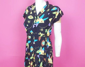 Amazing 1940s cold rayon maternity patterned dress in a bold colourful abstract print sold as is