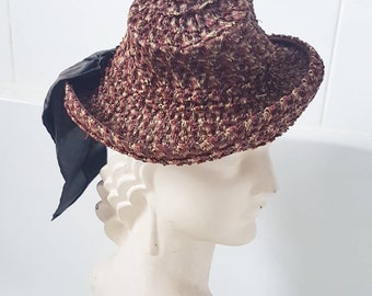 Sale Lovely jaunty late 1930s 40s brown orange cream woven hat  in a synthetic plastic type material with big brown ribbon detail at back