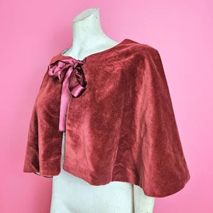 Gorgeous 1950s or could be later reddish velvet fully lined cape ribbon tie romantic