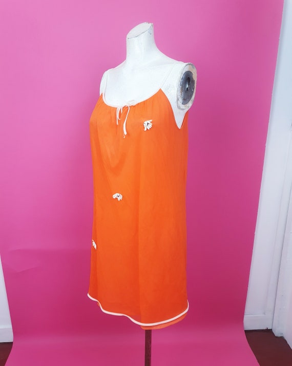 Cute 1960s orange slip dress flower sewn on - image 1