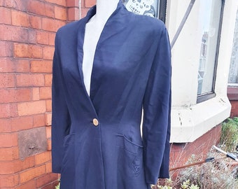 Stylish 1940s dark navy fit and flare princess coat fab arrow details on the pockets one button fastening