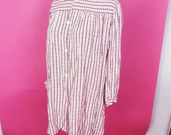 Cute 1940s smock blouse in pale pink white and black could be worn as a dress or a lightweight jacket little pocket