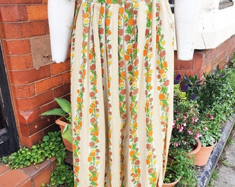 Sale Pretty 1940s floppy smooth silky rayon cream skirt with orange brown green striped pattern perfect for Summer