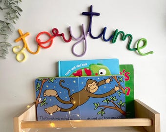 Curved multicoloured rainbow storytime wall sign for nursery , kids room , reading corner or playroom, bookworm gift idea