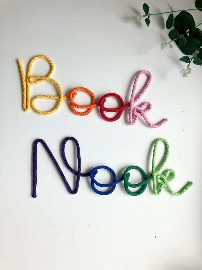 Rainbow multicolored knitted rope ‘Book Nook’ sign for kids reading corner wall decor