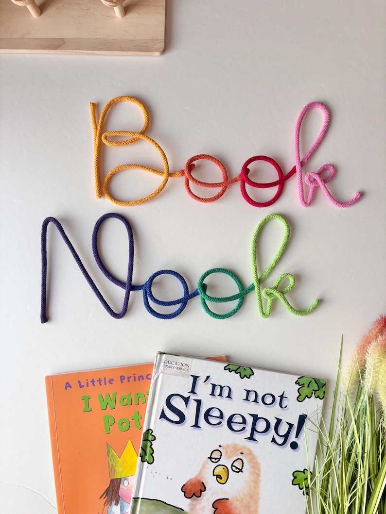 Colorful Book Nook sign decorating playroom reading nook
