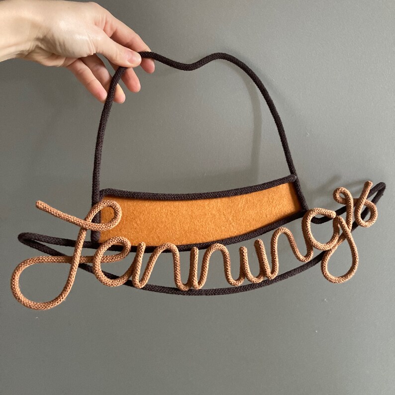 Rope and wire cowboy hat wall art with custom name, ideal for baby shower or birthday gift.