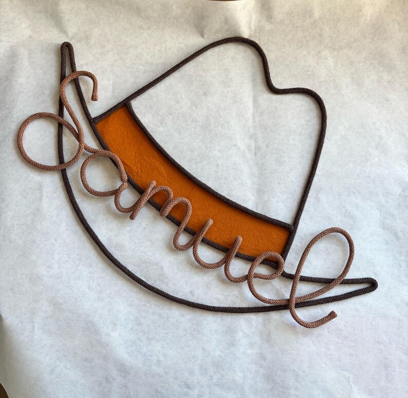 decorative cowboy hat shape name sign for kids room with the name Samuel