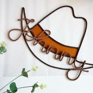 Custom cowboy hat name wall hanging, great for toddlers, nurseries, or themed playrooms.
