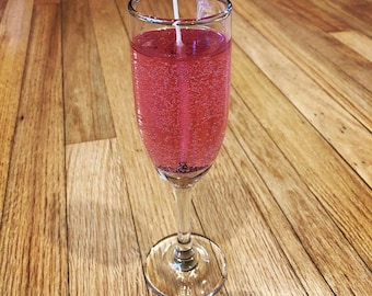 Pink Champagne Scented Long Lasting Gel Candle in Flute Glass you can keep.  Comes in three bubbly scents.