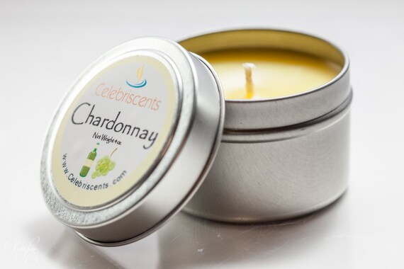 CHARDONNAY scented soy candle perfect for any occasion.  Same white grapes, woodsy chardonnay aroma poured in charming tin-container.