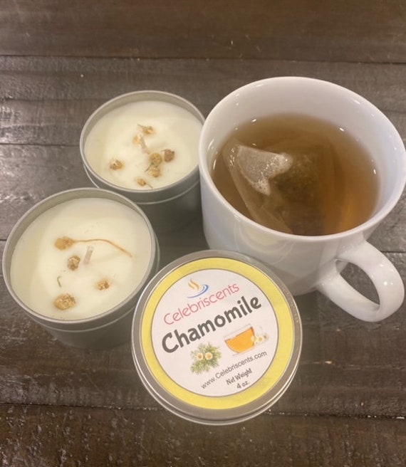 Soothing Chamomile scented soy candle with chamomile flowers atop candle making it easier to de-stress, relax and knock out anxiety.  Yes!!