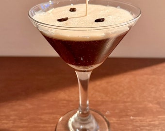 Espresso Martini Scented Candle with actual strong coffee notes with foam and three beans to perfect the alluring coffee.