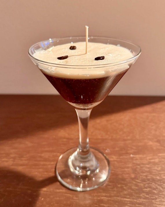 Espresso Martini Scented Candle with actual strong coffee notes with foam and three beans to perfect the alluring coffee.