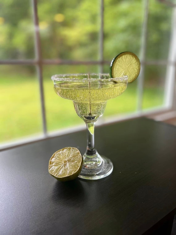 Festive Margarita Scented Long Lasting Gel Candle in sturdy Margarita Style Glass with actual Salt on Rim.  Perfect for Parties and Decor.