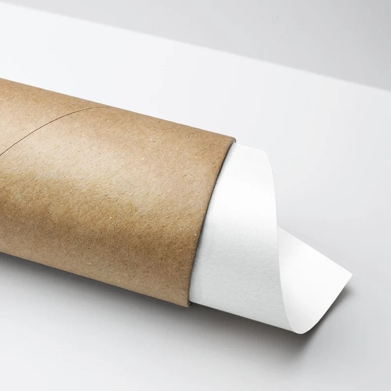 May include: A rolled-up print or poster, partially inserted into a brown cardboard tube. The white paper is visible, contrasting with the tube's color. The image is set against a plain white background.