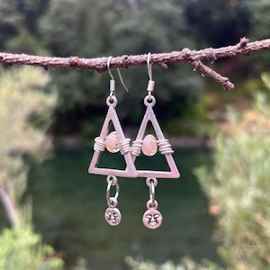 Moon face dangle earrings