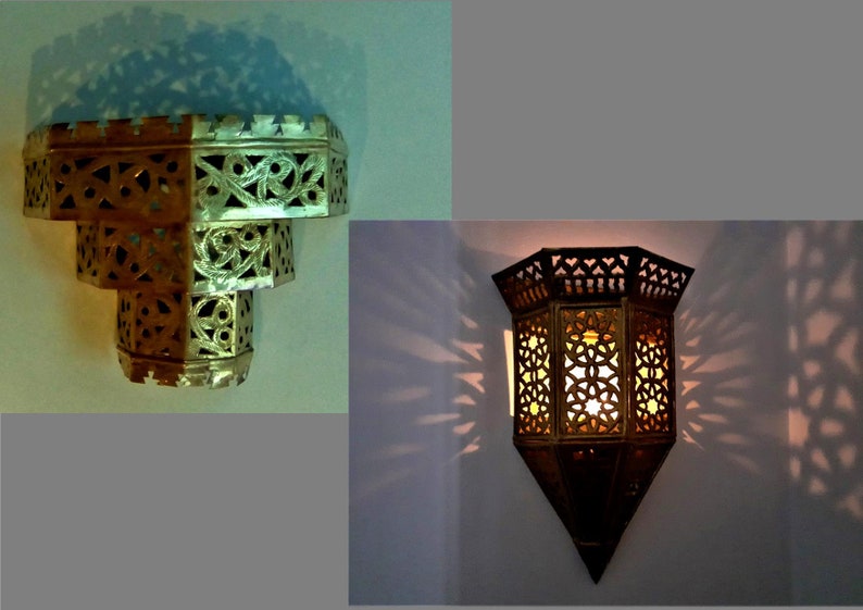 Moroccan brass lamps
1 Pair conical lamps of four geometric panels ending in pointed base and fluted top
 28cm x18cm
2 Pair stepped lamps in 3 tiers, widest at the top. Pierced with swirly pattern and castellated borders   
28cm x18cm