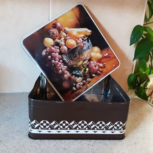 Large vintage biscuit tins, old cookie containers