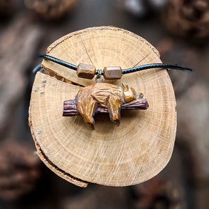 Sleeping Bear pendant  hand carved  on linden wood