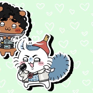May include: Two cartoon characters on a light green background with white hearts. One is a brown bear-like figure in a space suit. The other is a white squirrel-like character holding a microphone and wearing a jacket and a crown.