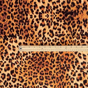 Statement leopard velvet fabric by the metre suitable for upholstery, curtains, crafts and interior design.