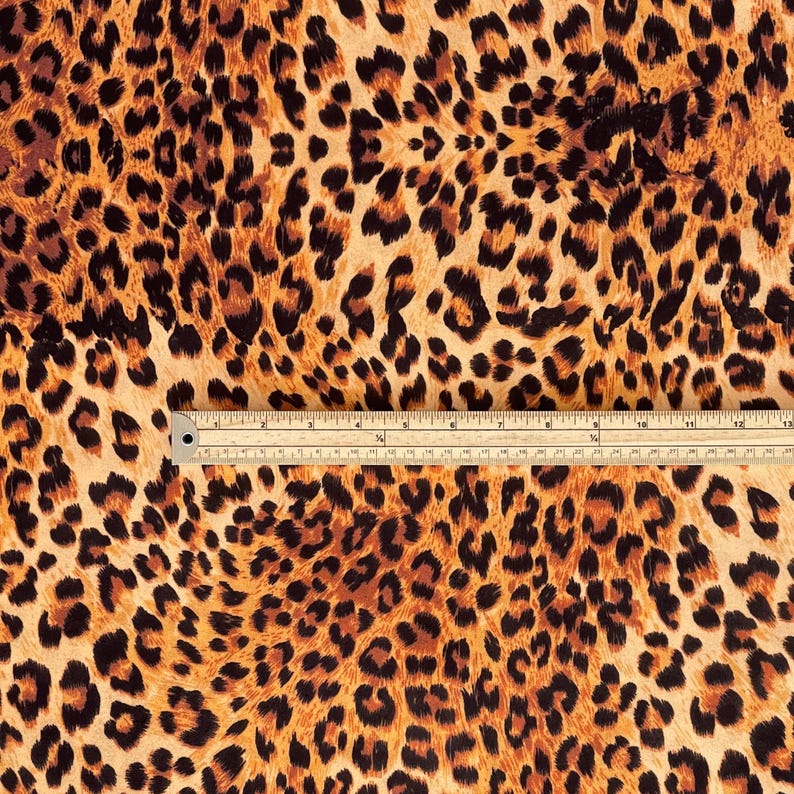 Statement leopard velvet fabric by the metre suitable for upholstery, curtains, crafts and interior design.