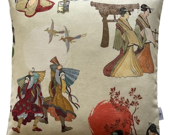 May include: A cream-colored throw pillow with a Japanese-inspired design. The pillow features images of people in traditional clothing, birds, and a red sun.