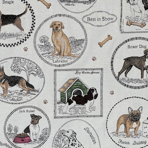 May include: A tapestry featuring various dog breeds, including a Beagle, Labrador, Boxer, Alsatian, King Charles Spaniel, Jack Russel, French Bulldog, and a Dalmatian. Each breed is depicted in a separate oval frame with its name written below. The tapestry has a beige background with a subtle floral pattern.
