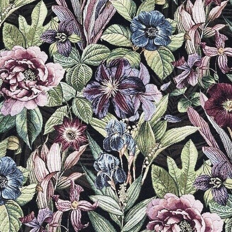 May include: A dark background with a floral pattern featuring various flowers in shades of purple, pink, blue, and green. The flowers are arranged in a random pattern and are surrounded by leaves.