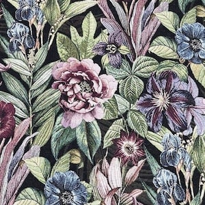 May include: A floral print fabric featuring a variety of flowers in shades of pink, purple, blue, and green on a black background.
